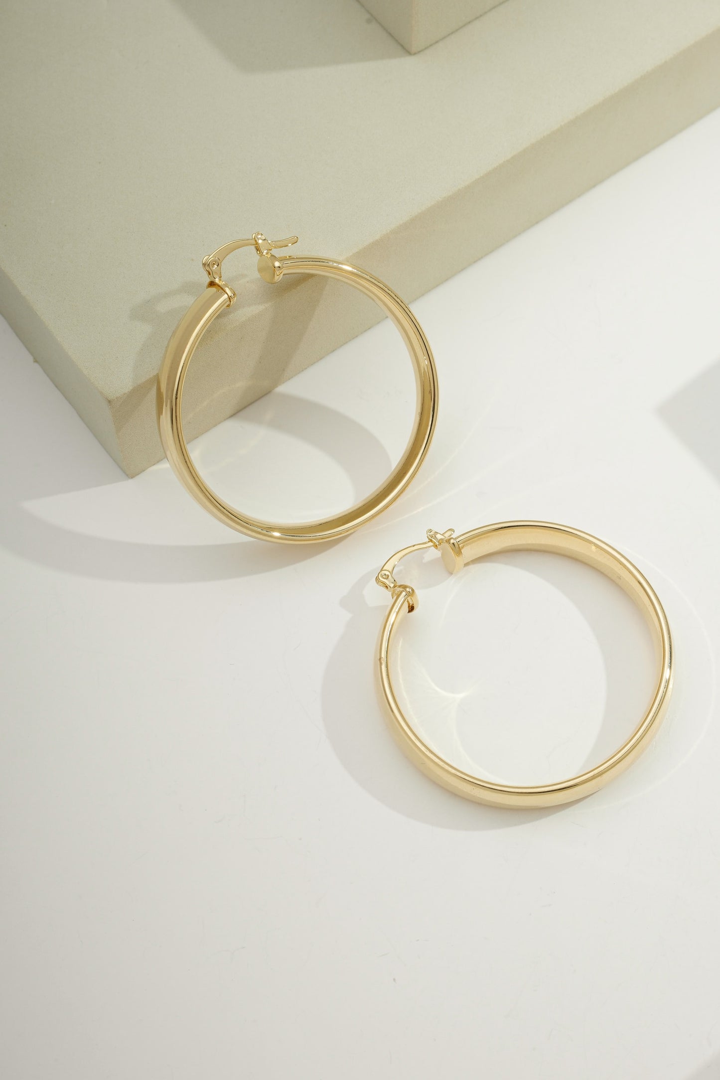Wide Flattened Tube Hoops Gold